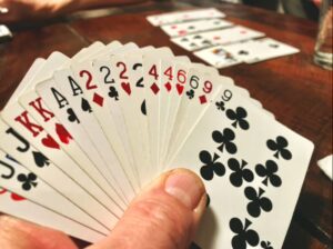 Playing cards spread out for a game of Indian rummy
