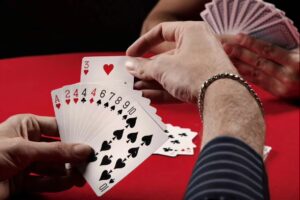Real cash rummy hand showing a pure sequence of cards on a table