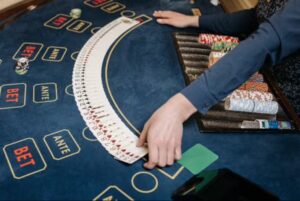 Rummy 500 sets and runs laid out on a table during play
